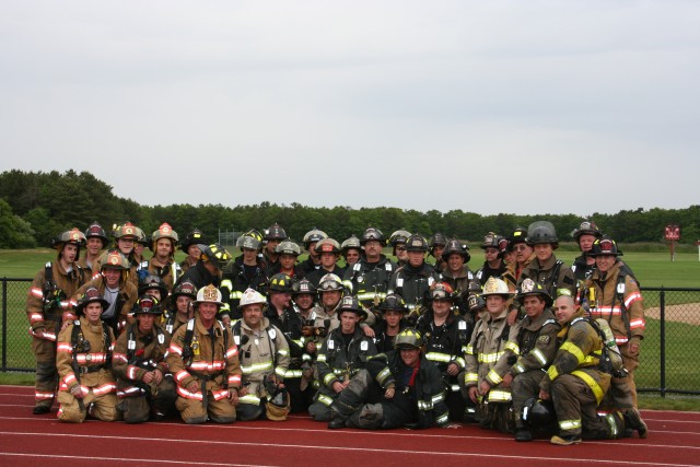 Members from the Center Moriches FD, East Moriches FD, Manorville FD and Eastport FD shoe their support at the 2009 Relay For Life